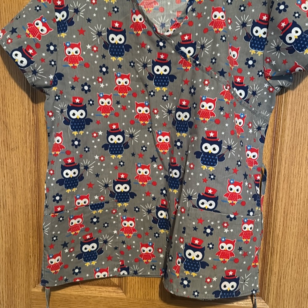 6 women’s scrub shirts, all sized small. Different brands and colors